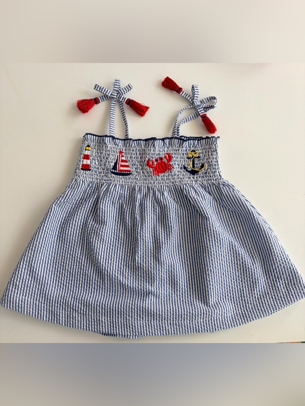 Mud Pie Blue and White Striped top with Red Tassels